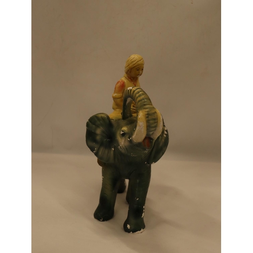 102 - A VINTAGE CHALK FIGURE OF A BOY ON AN ELEPHANT, HEIGHT 30CM, LENGTH APPROX 24CM