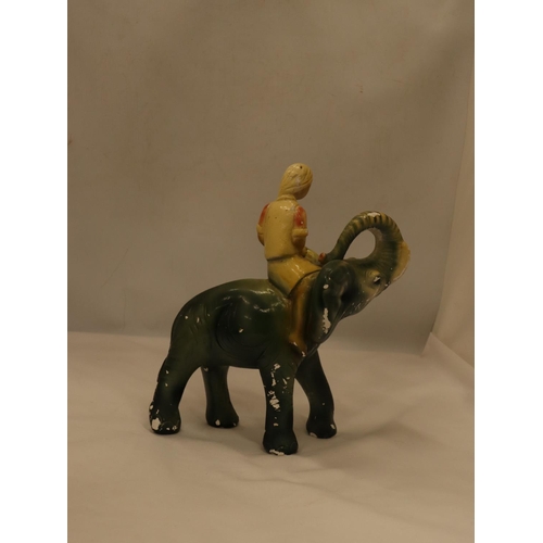 102 - A VINTAGE CHALK FIGURE OF A BOY ON AN ELEPHANT, HEIGHT 30CM, LENGTH APPROX 24CM