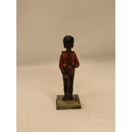 112 - A VINTAGE PAINTED BRONZE OF A GRENADIER GUARD, HEIGHT 20CM