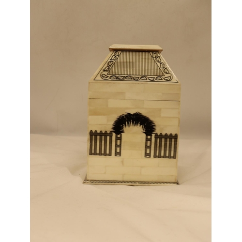 120 - A LIDDED 'BONE' STYLE CASKET BOX, HEIGHT 24CM