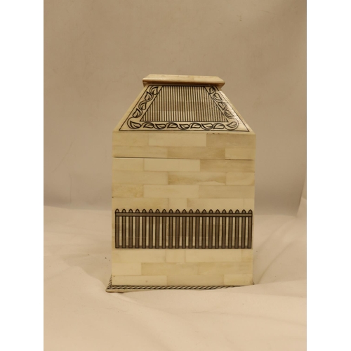 120 - A LIDDED 'BONE' STYLE CASKET BOX, HEIGHT 24CM