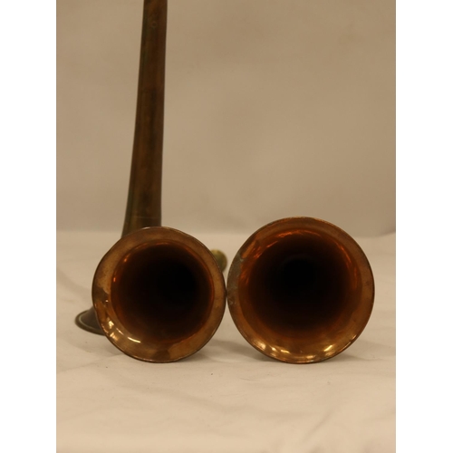 151 - FOUR GRADUATED VICTORIAN BRASS AND COPPER HUNTING HORNS