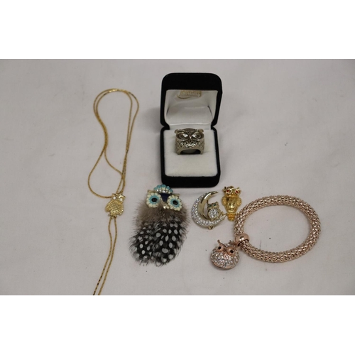 241 - A QUANTITY OF OWL RELATED COSTUME JEWELLERY TO INCLUDE A BOXED RING, BROOCH, NECKLACE, PENDANT, ETC