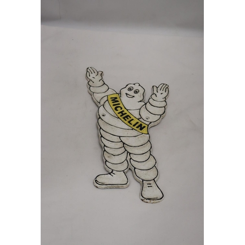 245 - A CAST MICHELIN MAN SIGN, HEIGHT 32CM