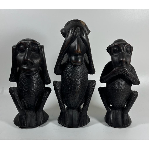 331 - A SET OF THREE AFRICAN TRIBAL CARVED HARDWOOD EBONY EFFECT 'SPEAK NO, HEAR NO, SEE NO EVIL' MONKEYS,... 