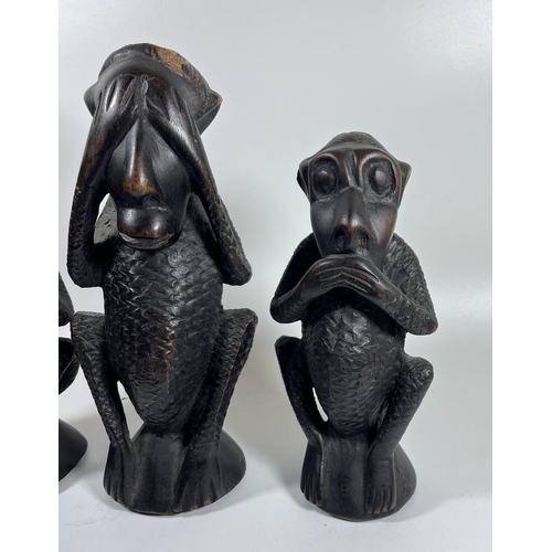 331 - A SET OF THREE AFRICAN TRIBAL CARVED HARDWOOD EBONY EFFECT 'SPEAK NO, HEAR NO, SEE NO EVIL' MONKEYS,... 