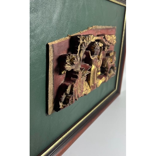 338 - A CHINESE LACQUERED AND GILT CARVED WOODEN PANEL, ON LATER GREEN LEATHER MOUNT AND WOODEN FRAME, 36 ... 