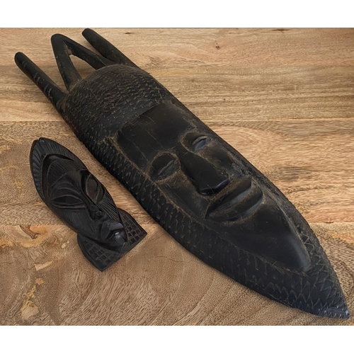 358 - TWO VINTAGE 20TH CENTURY HEAVY AFRICAN TRIBAL WOODEN MASKS, SMALLER ONE WITH EXPORT LABEL TO REVERSE... 