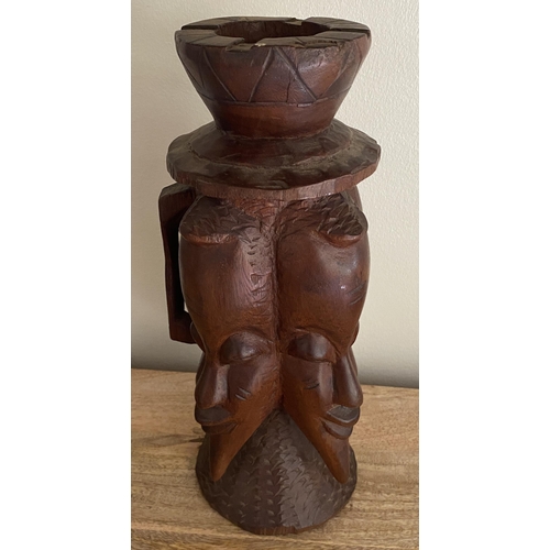 359 - A VINTAGE MID 20TH CENTURY AFRICAN TRIBAL CARVED WOODEN FACE MASK JUG WITH HANDLE AND ASHTRAY DESIGN... 