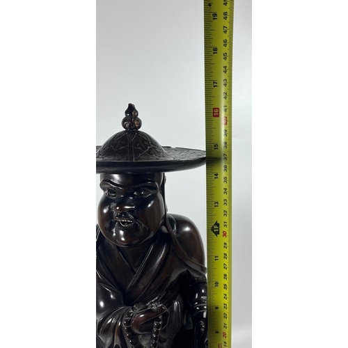 373 - A LARGE ANTIQUE CHINESE CARVED ROOTWOOD FIGURE OF A MAN WITH BONE EYES AND TEETH, HEIGHT 41CM