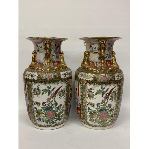 388 - A LARGE PAIR OF CHINESE FAJMILLE ROSE VASES WITH LIZARD MOULDED NECK AND LION HANDLES