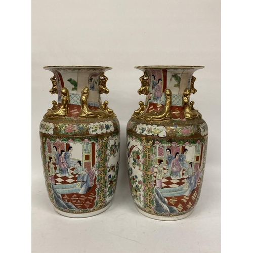 388 - A LARGE PAIR OF CHINESE FAJMILLE ROSE VASES WITH LIZARD MOULDED NECK AND LION HANDLES