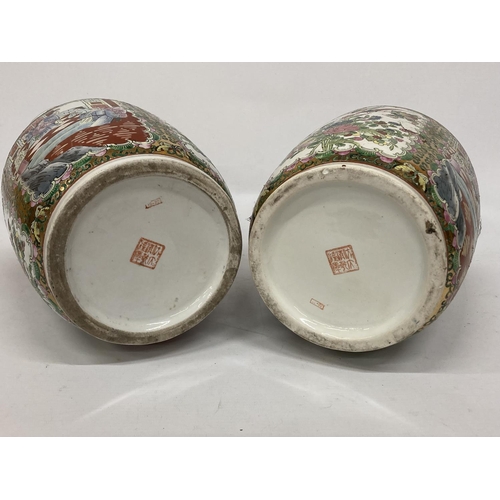 388 - A LARGE PAIR OF CHINESE FAJMILLE ROSE VASES WITH LIZARD MOULDED NECK AND LION HANDLES