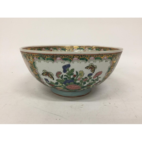 399 - A CANTON FAMILLE ROSE FOOTED BOWL - 12CM (H) 25.5 (W)