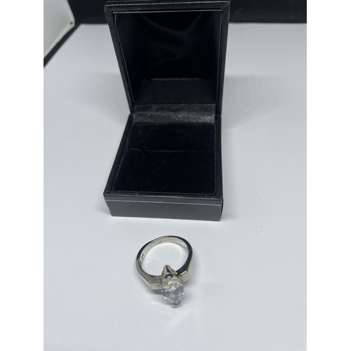 521 - A LADIES SILVER DRESS RING, BOXED