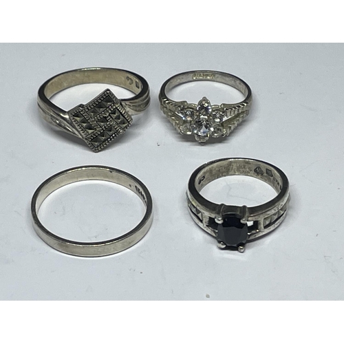 547 - FOUR ASSORTED SILVER RINGS