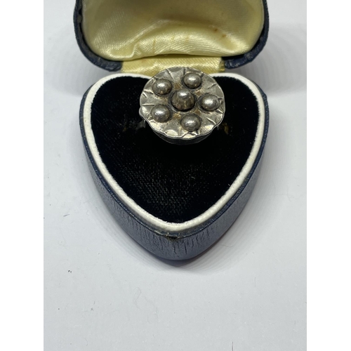 567 - A BOXED SILVER RING