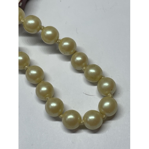 571 - A BOXED PEARL NECKLACE