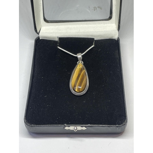 572 - A BOXED SILVER TIGERS EYE NECKLACE