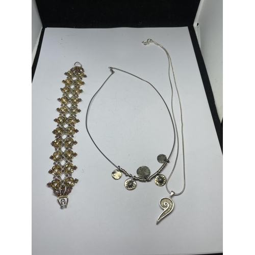 579 - TWO SILVER NECKLACES AND SILVER CLASP BRACELET