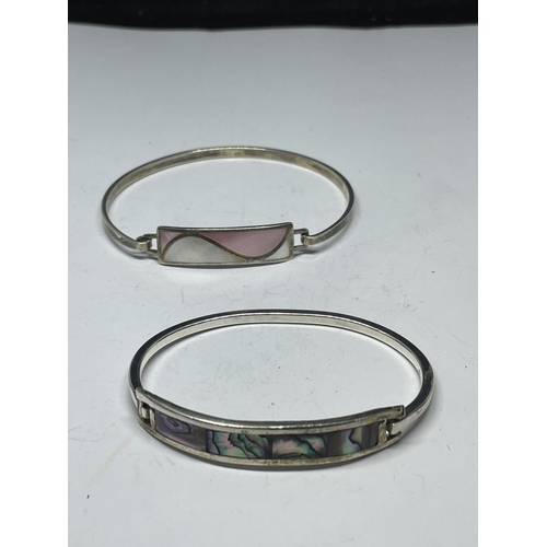 605 - TWO SILVER BANGLES