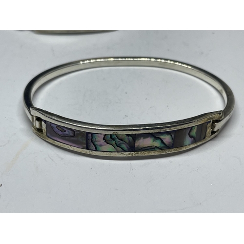 605 - TWO SILVER BANGLES