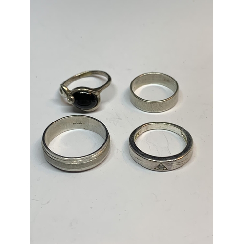 643 - FOUR SILVER RINGS