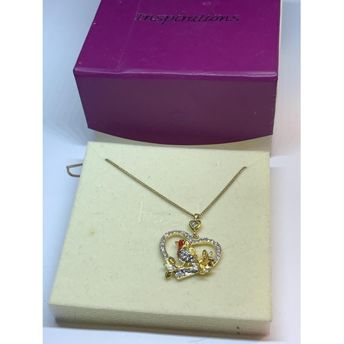 649 - A NECKLACE WITH A CRYSTAL ROBIN PENDANT IN A PRESENTATION BOX