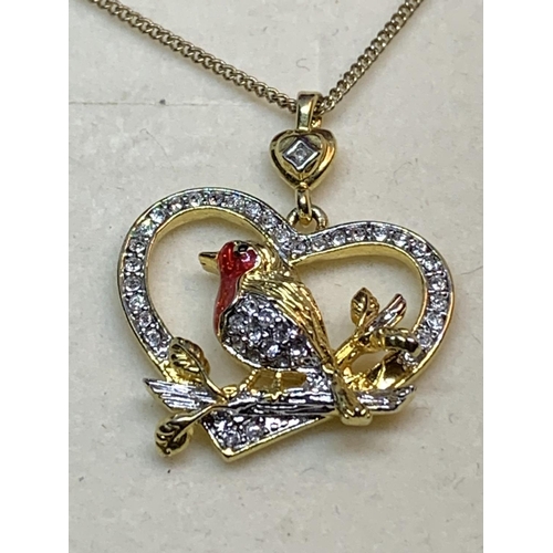 649 - A NECKLACE WITH A CRYSTAL ROBIN PENDANT IN A PRESENTATION BOX