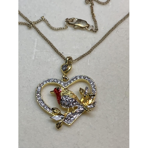 649 - A NECKLACE WITH A CRYSTAL ROBIN PENDANT IN A PRESENTATION BOX