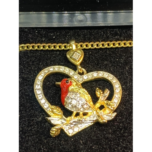 691 - A NECKLACE WITH A CRYSTAL ROBIN PENDANT IN A PRESENTATION BOX