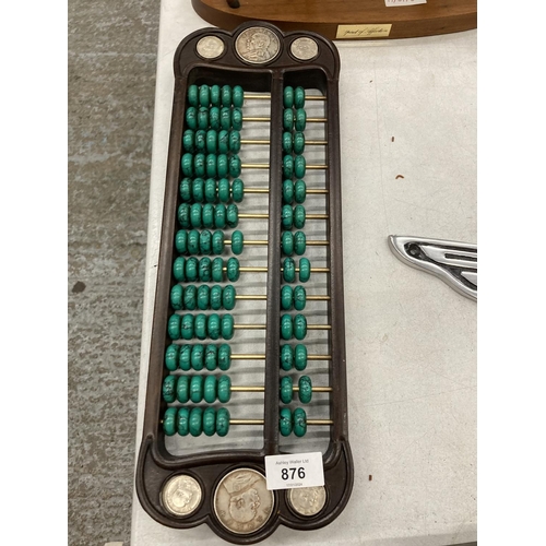 876 - A CHINESE ABACUS WITH MALACHITE COUNTERS AND SILVER COINS