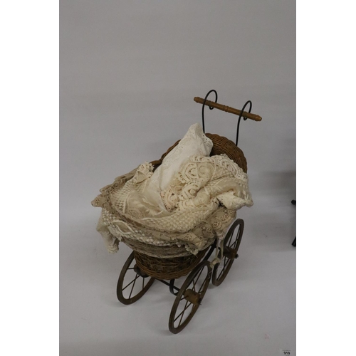 919 - A VICTORIAN CHILD'S PRAM WITH LACE COVERS