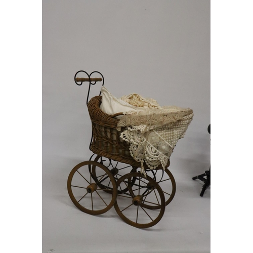 919 - A VICTORIAN CHILD'S PRAM WITH LACE COVERS