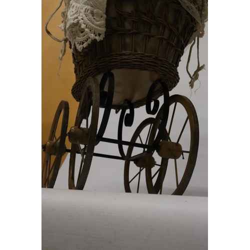 919 - A VICTORIAN CHILD'S PRAM WITH LACE COVERS