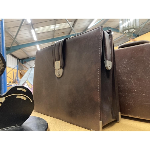 977 - TWO VINTAGE LEATHER BRIEFCASES