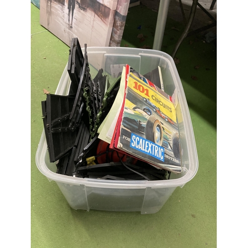 1073 - A SCALEXTRIC TRACK TOGETHER WITH BOOKLETS AND POWERPACK