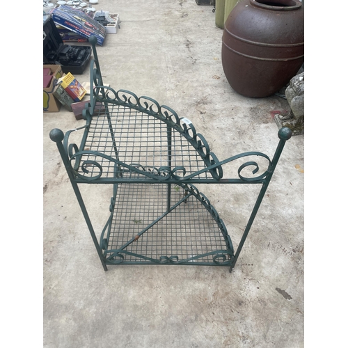 1507 - A VINTAGE WROUGHT IRON GARDEN CORNER PLANT STAND