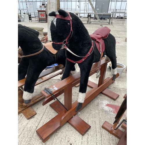 1706 - A VINTAGE PEGASUS BLACK AND WHITE ROCKING HORSE