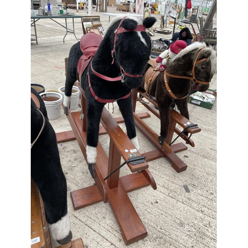 1706 - A VINTAGE PEGASUS BLACK AND WHITE ROCKING HORSE