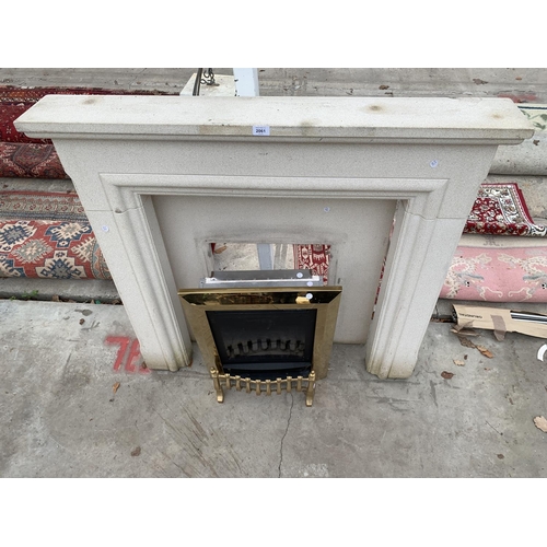 2061 - A GAS FIRE WITH DECORATIVE STONE EFFECT SURROUND