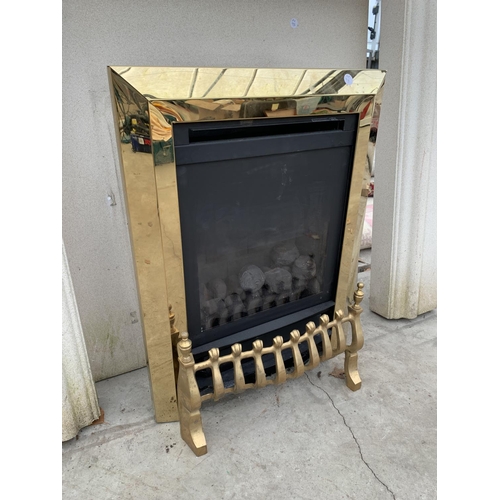 2061 - A GAS FIRE WITH DECORATIVE STONE EFFECT SURROUND