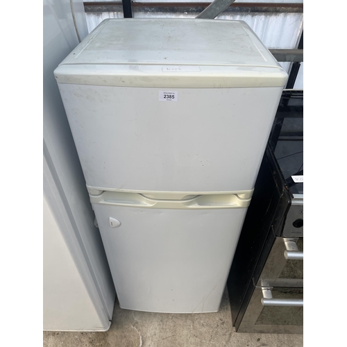 2385 - A SMALL WHITE UPRIGHT FRIDGE FREEZER