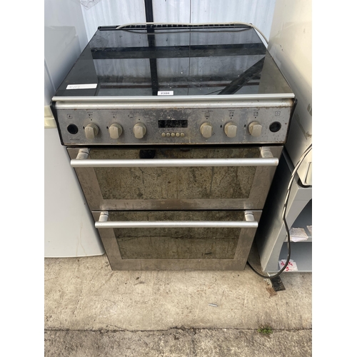 2386 - A BLACK AND STAINLESS STYEEL GAS OVEN AND HOB