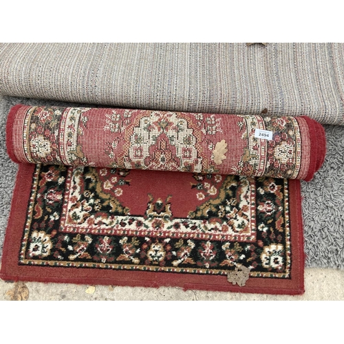 2494 - A SMALL RED PATTERNED RUG AND A MODERN GREY RUG