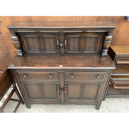 2531 - A REPRODUCTION OAK COURT CUPBOARD WITH CARVED PANEL DOORS AND DRAWERS, 51