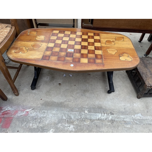 2538 - A RETRO TEAK COFFEE/GAMES TABLE WITH INLAID DRAUGHTS BOARD AND CARD SUITS