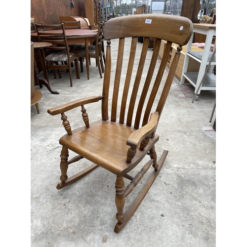 2547 - A VICTORIAN STYLE ELM AND BEECH ROCKING CHAIR