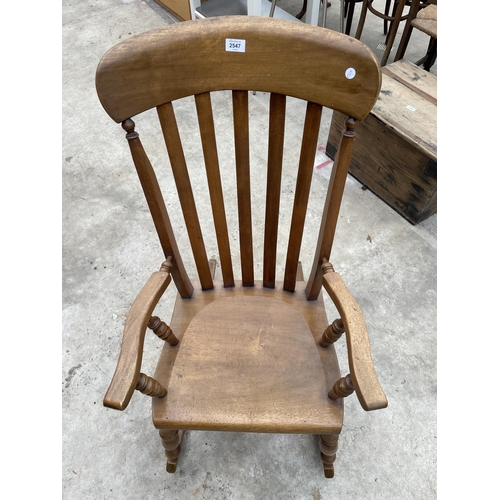 2547 - A VICTORIAN STYLE ELM AND BEECH ROCKING CHAIR