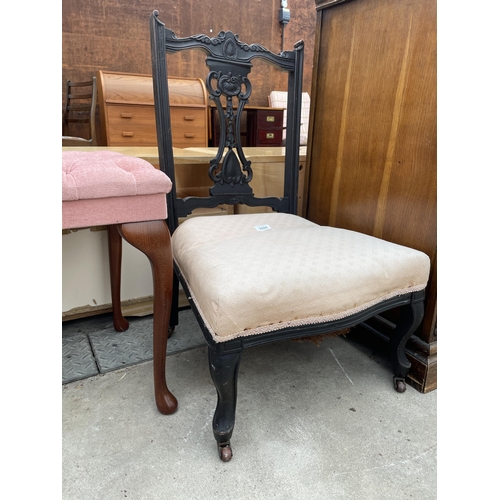 2595 - AN EDWARDIAN EBONISED NURSING CHAIR AND TWO MODERN STOOLS